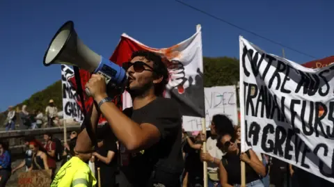 Nationwide Strikes Break Out Against Fiscal Cuts